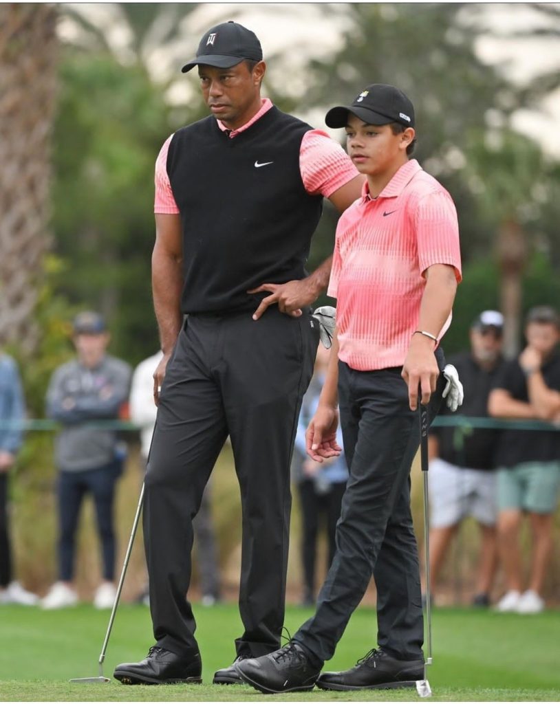 Charlie Woods with their father Tiger Woods